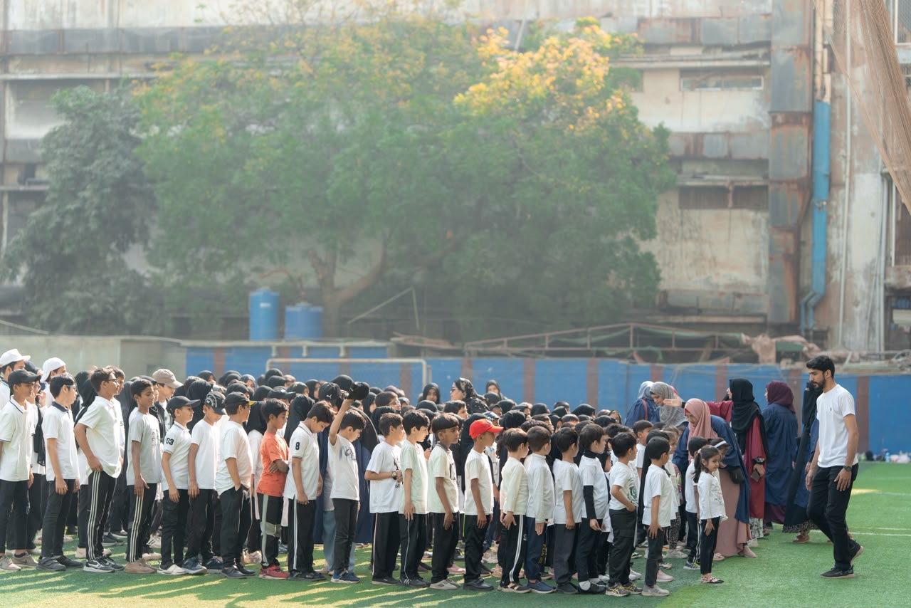 Students and staff at a Noor-ul-Emaan School event in Karachi